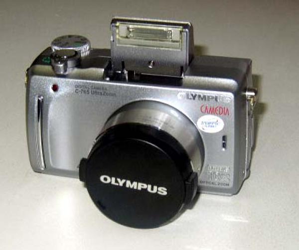 Фотоаппарат цифровой Olympus C- 765 Ultra Zoom, 4Mpix, Zoom 10x/3x, TFT 1.8", TB выход, USB2.0, xD-Picture 16M, аккумулятор